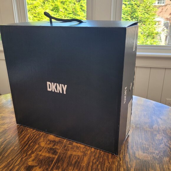 DKNY Buckled Straps Accent Combat Boots. Black Leather and Silver-Tone Metal. 7. - Picture 4 of 11